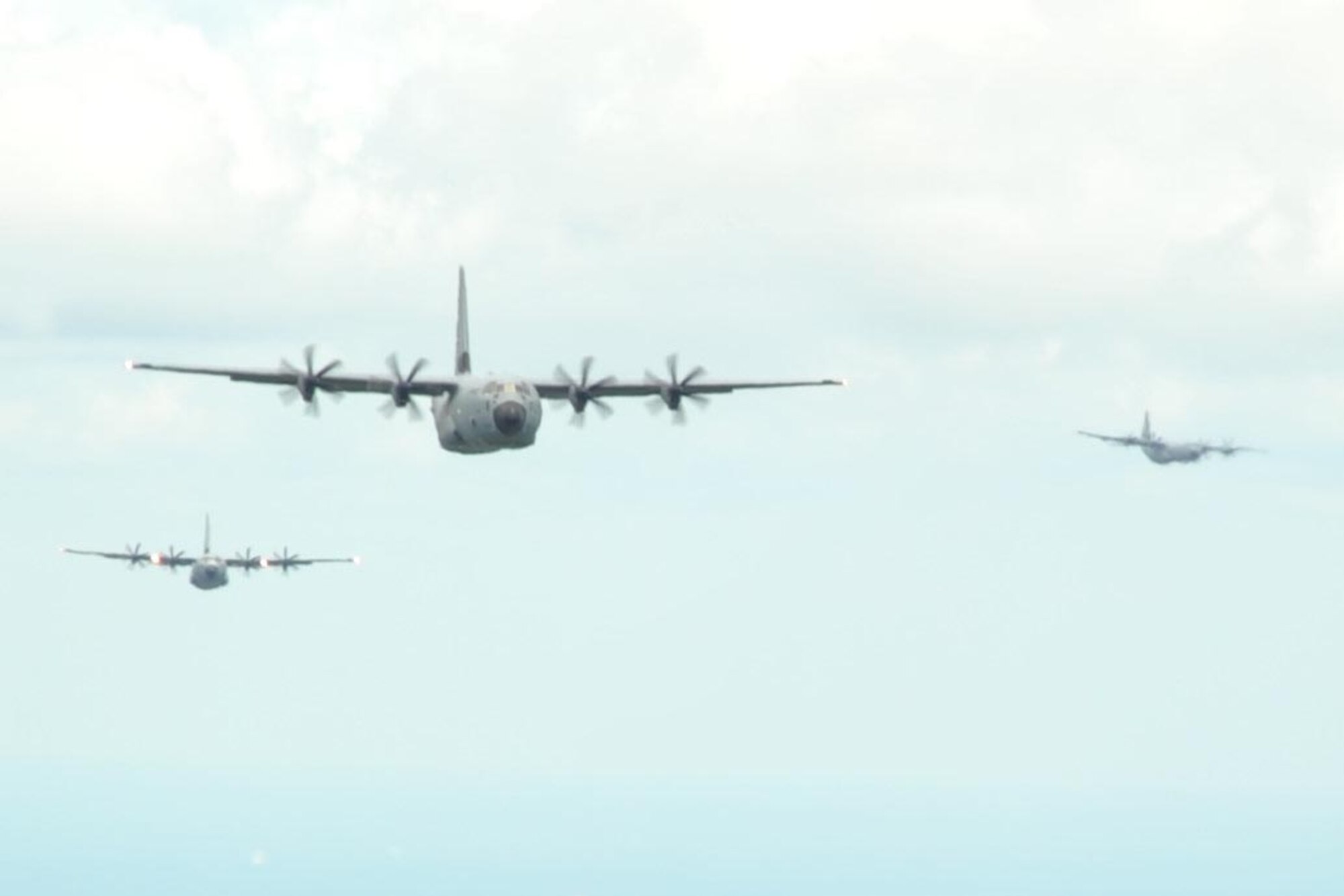 815th Airlift Squadron C-130J aircraft fly over the Mississippi Gulfcoast during a four-aircraft training mission Sept. 11, 2016. The aircraft took off from Keesler Air Force Base, Mississippi, and airdropped simulated cargo and heavy equipment over Stennis International Airport, Mississippi. (U.S. Air Force photo/Tech. Sgt. Ryan Labadens)