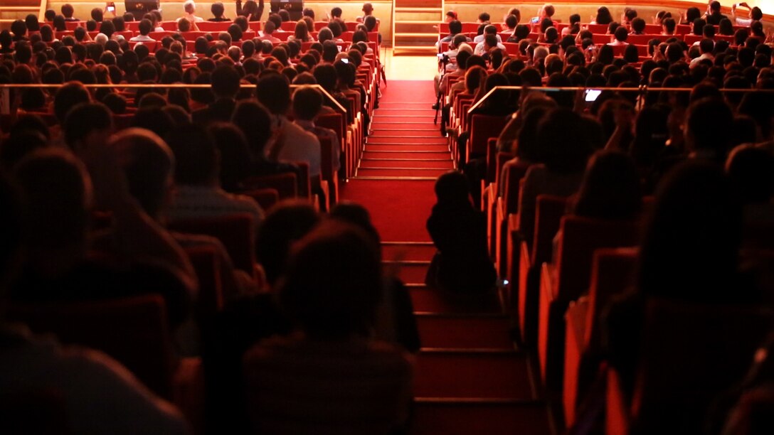 A full hall listens to the combined band play during the 21st Annual Combined Band Concert at the Okinawa Civic Hall, Okinawa, Japan, September 10, 2016. The 21st Annual Combined Concert between the Japan Ground Self Defense Force 15th Brigade Band and the III Marine Expeditionary Force Band was a way for both bands to reach out to the community and to share years of friendship through music.  (U.S. Marine Corps photo by Lance Cpl. Nelson Duenas/ Released)