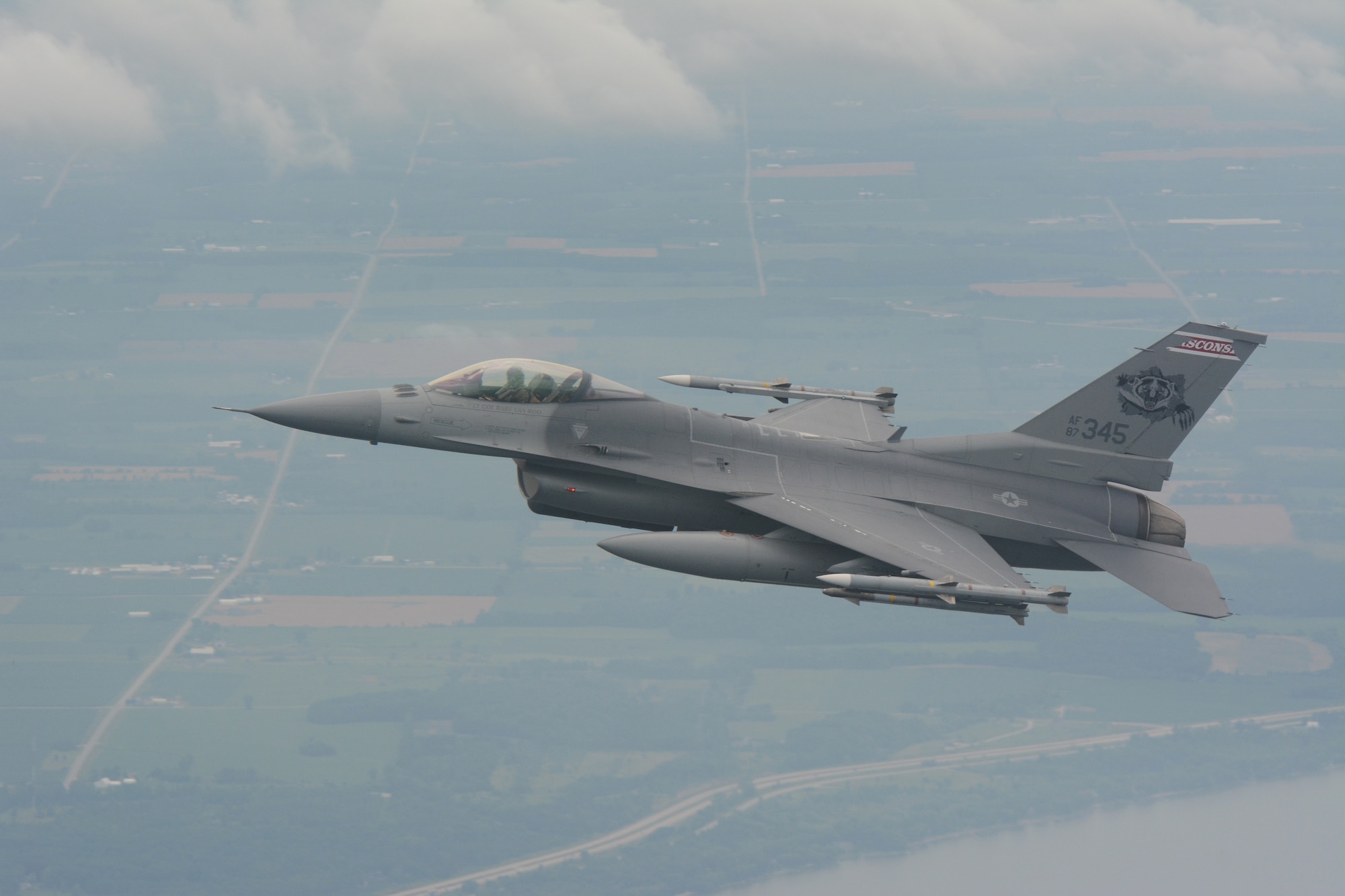 An F-16 Fighting Falcon circles a Cessna aircraft during a fertile keynote exercise in the airspace above central Wisconsin on July 12, 2016. A fertile keynote is a term used to describe practice intercept missions. The 115th Fighter Wing has been exercising its aerospace control mission since the events of 9/11. (U.S. Air National Guard photo by Staff Sgt. Andrea F. Rhode)