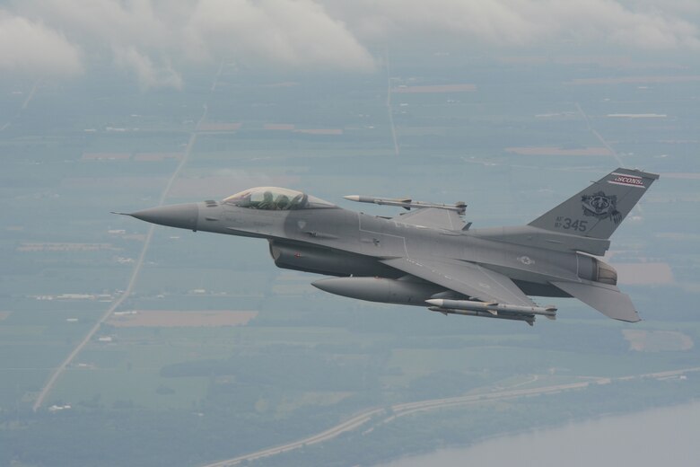 An F-16 Fighting Falcon circles a Cessna aircraft during a fertile keynote exercise in the airspace above central Wisconsin on July 12, 2016. A fertile keynote is a term used to describe practice intercept missions. The 115th Fighter Wing has been exercising its aerospace control mission since the events of 9/11. (U.S. Air National Guard photo by Staff Sgt. Andrea F. Rhode)
