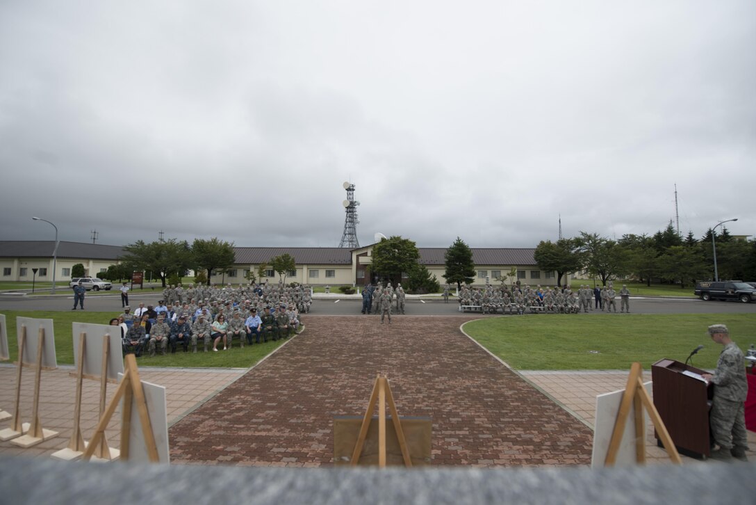 Attendees from across Misawa Air Base, Japan, sit during the 2016 POW/MIA and 9/11 remembrance ceremony Sept. 9, 2016. To this day, 14 members of the Wild Weasel family are among the 82,672 POW/MIA, with only two returning to their families. The 9/11 portion of the ceremony honored the 343 firefighters who gave their lives to save others that day. (U.S. Air Force photo by Senior Airman Brittany A. Chase)