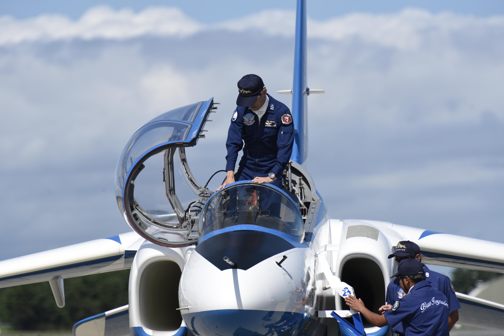 Japan Air Self-Defense Force Captain Yoshida, a pilot with Blue Impulse, sits in the cockpit of a Kawasaki T-4 prior to their aerobatic demonstration during Misawa Air Fest 2016 at Misawa Air Base, Japan, Sept. 11, 2016. Blue Impulse is an aerobatic team assigned with the JASDF 4th Air Wing, at Matsushima Air Base, Japan. (U.S. Air Force photo by Airman 1st Class Sadie Colbert)