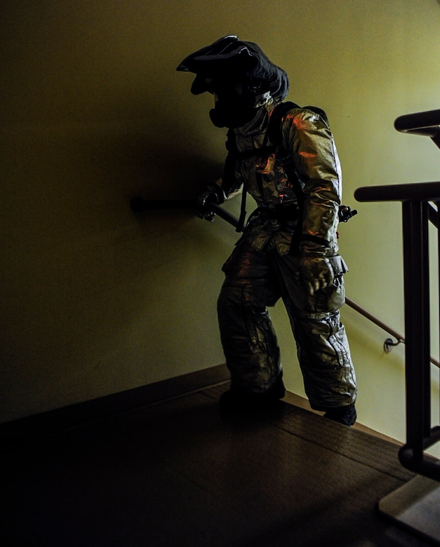 A U.S. Air Force firefighter from the 8th Civil Engineer Squadron climbs up a flight of stairs at Kunsan Air Base, Republic of Korea, Sept. 12, 2016. The 9/11 memorial stair climb event is a tribute to the 343 firefighters who gave their lives during the tragic events at the World Trade Center on September 11, 2001. (U.S. Air Force photo by Senior Airman Colville McFee/Released)