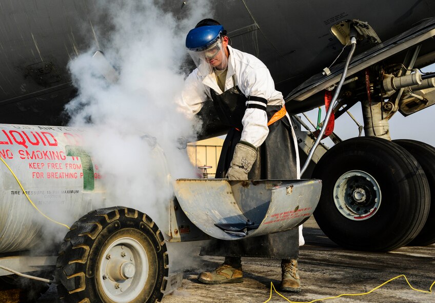 Senior Airman Christopher Martinez, 8th Expeditionary Air Mobility Squadron crew chief, purges a tank of liquid oxygen as he recharges a C-17 Globemaster III Sept. 3, 2016, at Al Udeid Air Base, Qatar. Martinez joined the Air Force in November 2013 to follow his father’s footsteps as a crew chief and later on cross-trained to the electrical field. (U.S. Air Force photo/Senior Airman Janelle Patiño/Released)