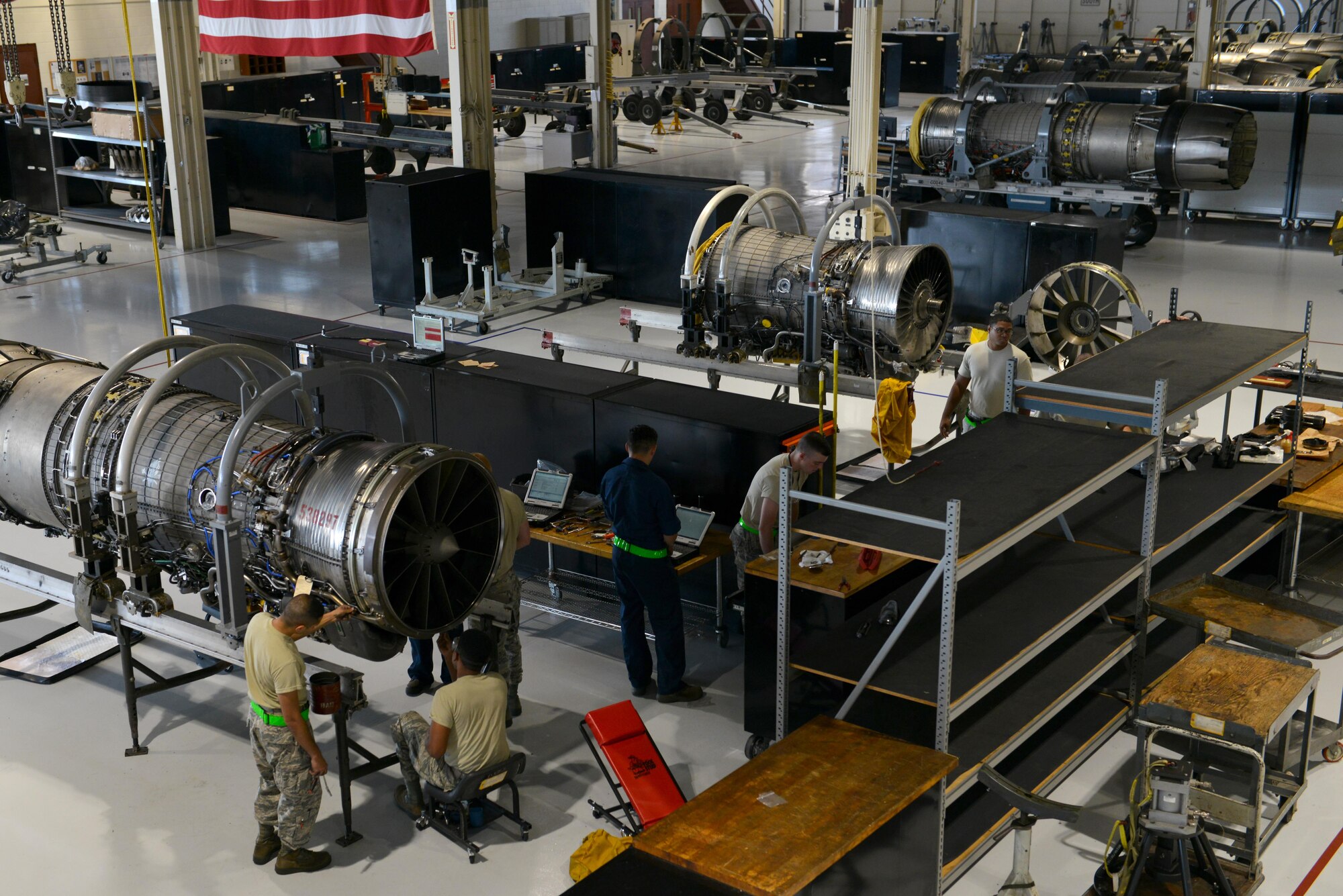 U.S. Airmen assigned to the 20th Component Maintenance Squadron aerospace propulsion flight perform maintenance on F-129B engines at Shaw Air Force Base, S.C., Sept. 7, 2016. In the past 12 months, the flight serviced 28 engines, ranging from simple repairs to full rebuilds. (U.S. Air Force photo by Airman 1st Class Destinee Sweeney)