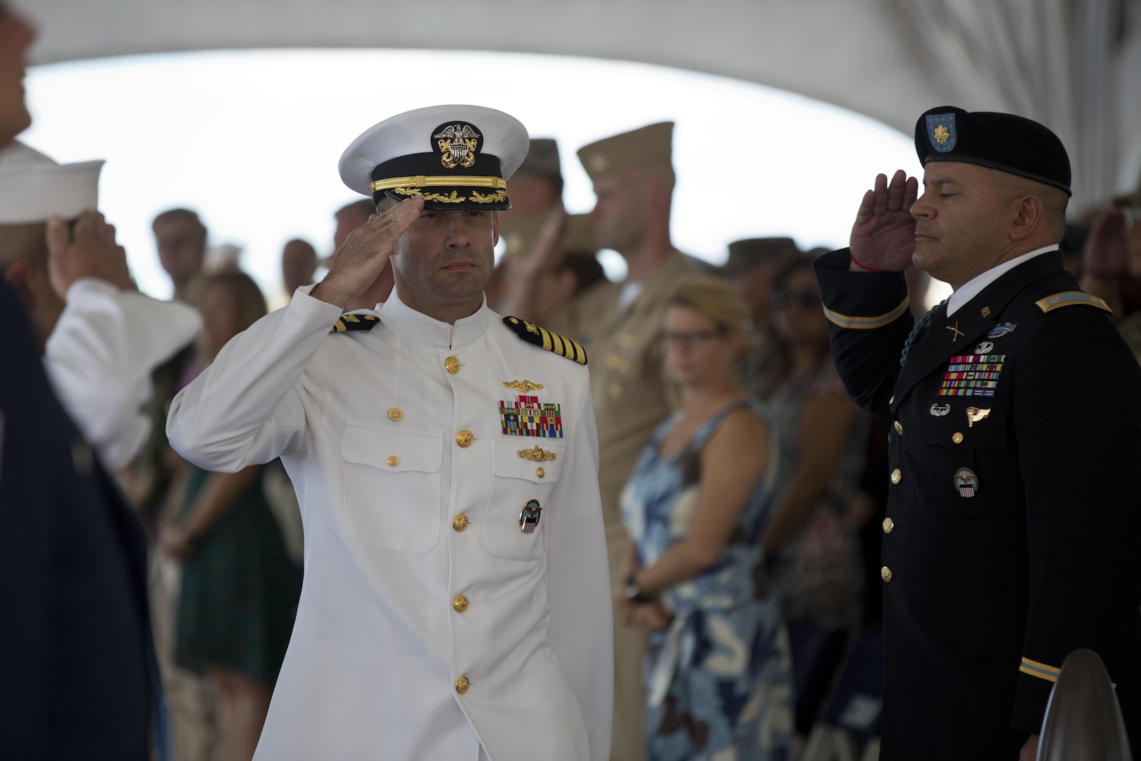 Navy Capt. Timothy Daniels is piped ashore as the new DLA Pacific commander in a Sept. 6 ceremony aboard the USS Missouri, Joint Base Pearl Harbor/Hickam Hawaii.