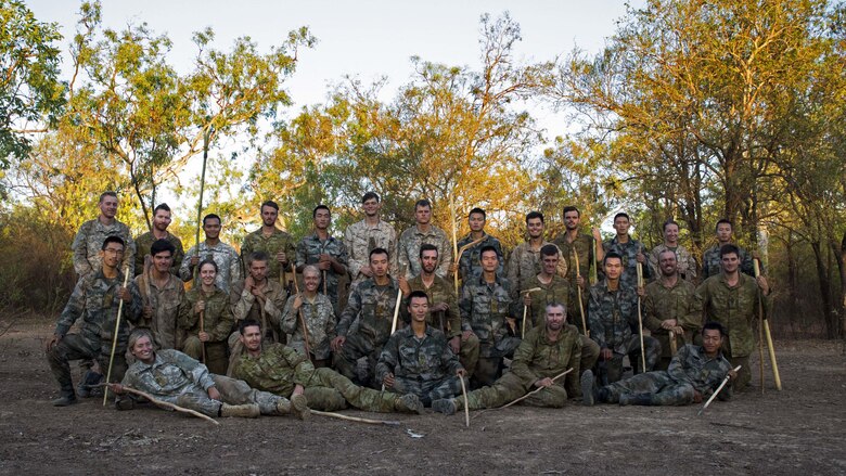 U.S. Marines, Australian Army soldiers, and People’s Liberation Army soldiers pose for a group photo during Exercise Kowari at Daly River region, Northern Territory, Australia, Sept. 8, 2016. The purpose of Exercise Kowari is to enhance the United States, Australia, and China’s friendship and trust, through trilateral cooperation in the Indo-Asia-Pacific region.