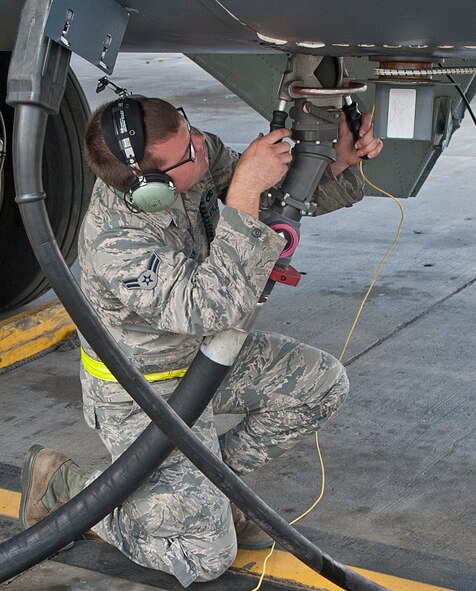 Airman 1st Class Sawyer Anderson, a member of the 5th Aircraft Maintenance Squadron, disconnects a single point hose from a B-52H Stratofortress on the flightline at Minot Air Force Base, N.D., Sept. 6, 2016. It takes approximately one hour to complete the refueling process for a B-52 using this fuel system, which pumps fuel from the ground in a continuous loop. (U.S. Air Force photo/Airman 1st Class Jonathan McElderry)