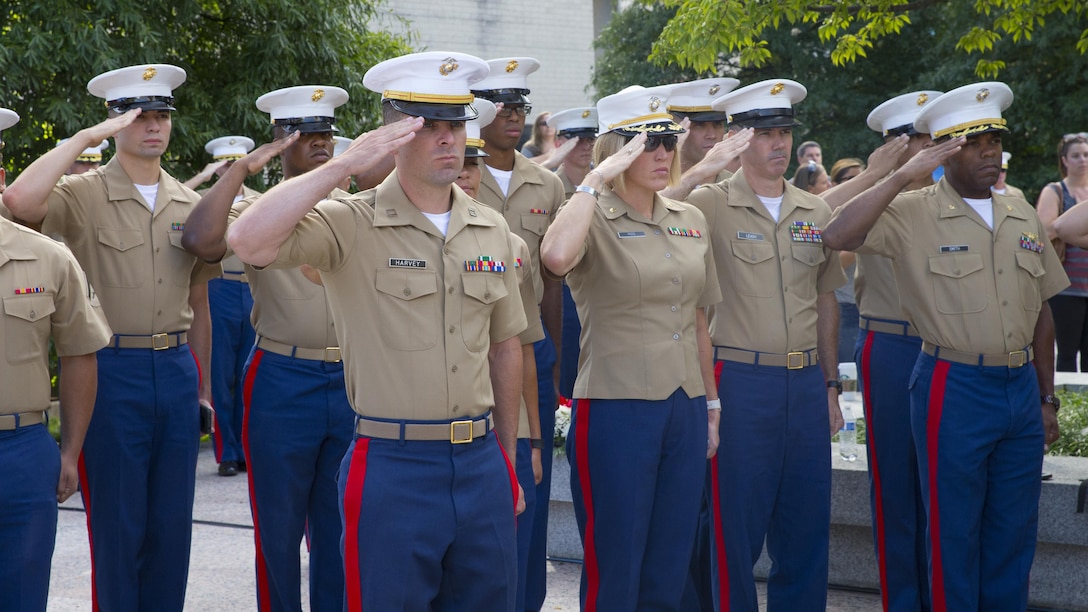 Marines with Special Purpose Marine Air Ground Task Force – Nashville salute during the playing of the National Anthem as part of a 9/11 Remembrance Ceremony in Nashville, Tenn., Sept. 11, 2016. Marine Week Nashville provides an opportunity for the Marine Corps to visit a city that normally doesn't have opportunities to interact with Marines on a regular basis.