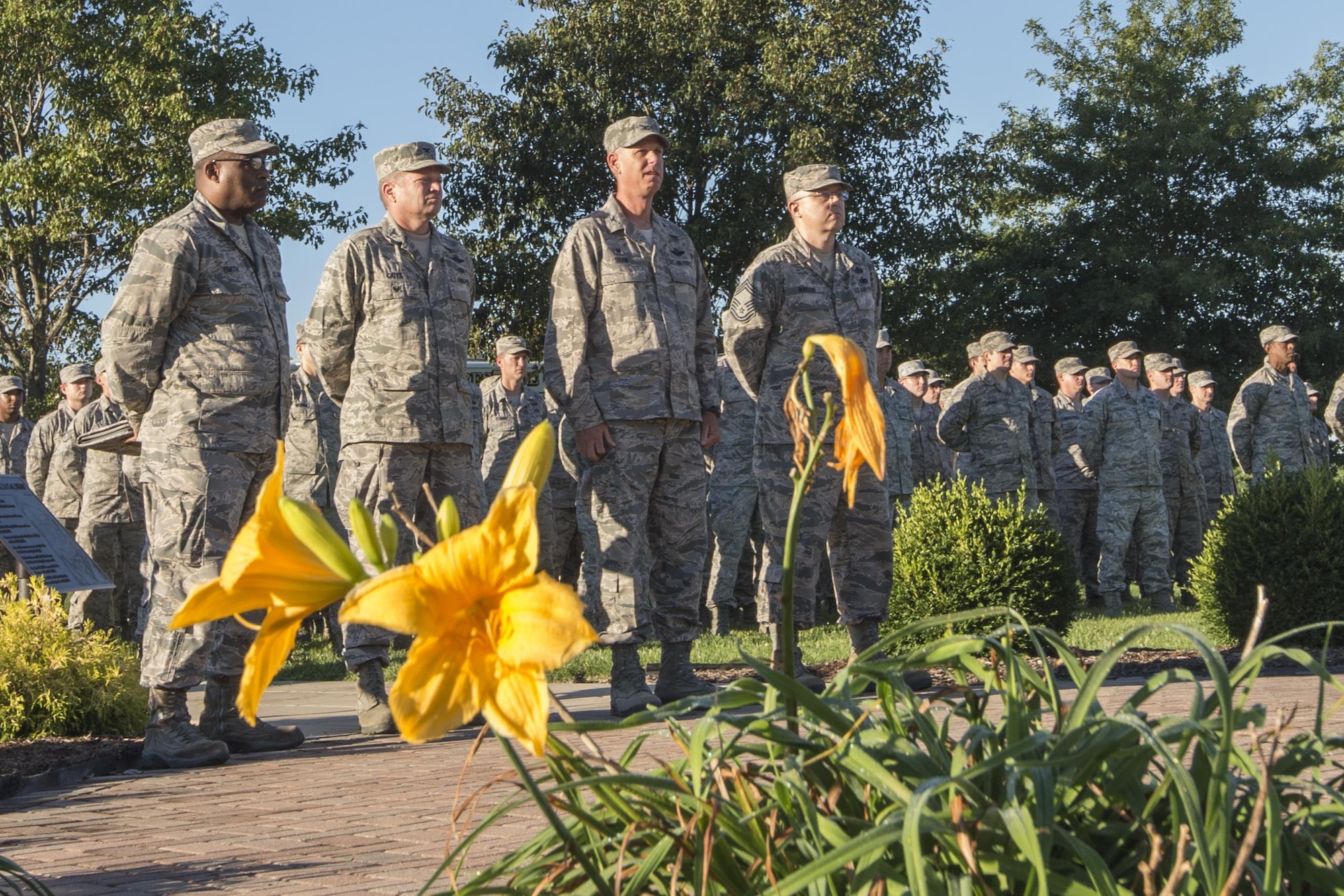 From left to right, Chap. (Lt. Col.) Obadiah Smith Jr., 434th Air Refueling Wing chaplain, Col. Paul Gates, 434th ARW vice commander, Col. Larry Shaw, 434th ARW commander, and Chief Master Sgt. Wes Marion, 434th ARW command chief, stand in formation during a 9/11 remembrance ceremony at Grissom Air Reserve Base, Ind., Sept. 11, 2016. During the event more than 500 Grissom Airmen, firefighters and civilians joined Americans around the world share a moment of silence to remember the victims and pay their respects. (U.S. Air Force photo/Tech. Sgt. Benjamin Mota)