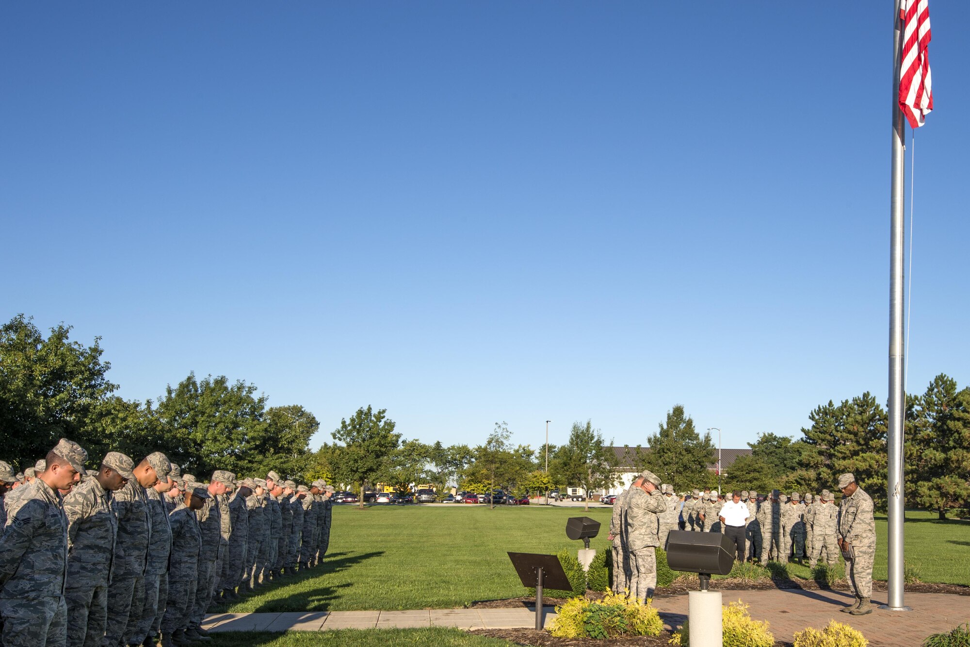 Grissom Airmen, firefighters and civilians joined Americans around the world and shared a moment of silence during a 9/11 memorial ceremony at Grissom Air Reserve Base, Sept. 11, 2016. The ceremony started at 8:46 a.m., the time the first aircraft crashed into the World Trade Center on Sept. 11, 2001. (U.S. Air Force photo/Tech. Sgt. Benjamin Mota)