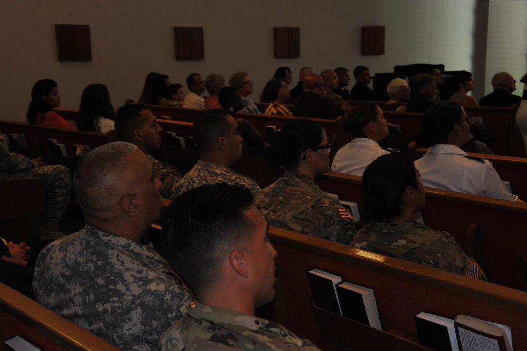 Members from the Armed Forces, First Responders and Family members listening to the Speakers remarks.