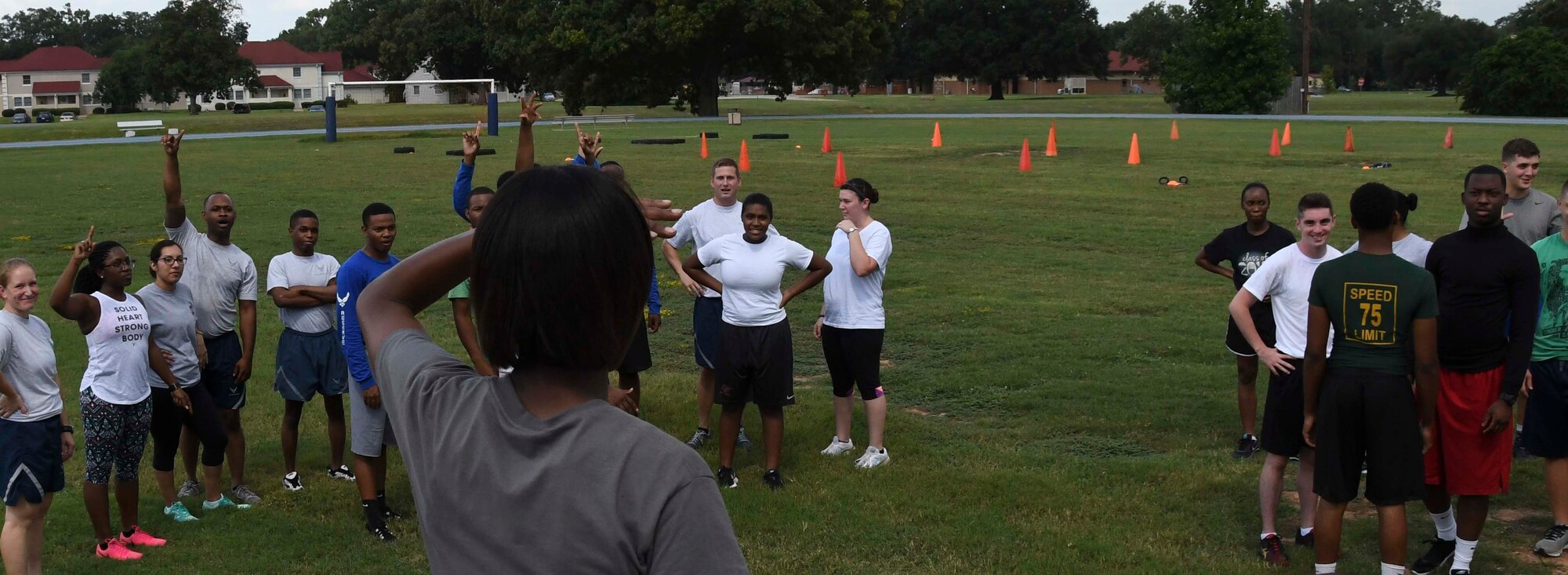 U.S. Air Force Master Sgt. Alicia D. Williams, 307th Force Support Squadron (FSS) wing fitness program manager, explains the rules of the Fit to Fight Challenge to trainees of the 307th Developmental Training Flight and Airmen of the 307th Bomb Wing, Sept. 11, 2016, at Barksdale Air Force Base, La.   The 307th FSS designed the challenge to encourage competition and boost morale within the 307th Bomb Wing. (U.S. Air Force photo by Senior Airman Callie Ware/ Released)