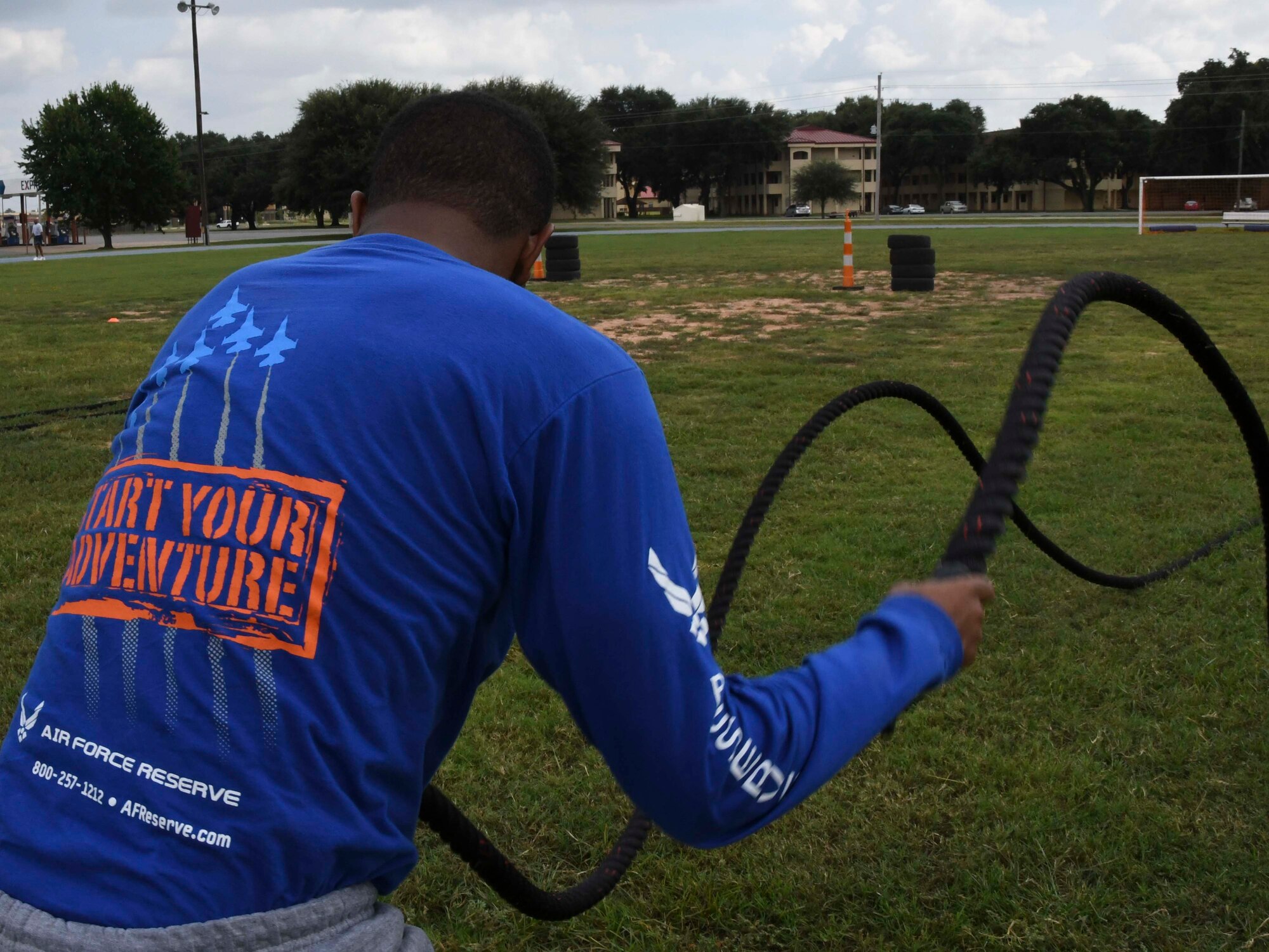 A member of the 307th Developmental Training Flight slings the battle ropes before moving on to the last obstacle during the 307th Bomb Wing Fit to Fight Challenge on Sept. 11, 2016, at Barksdale Air Force Base, La. The 307th Force Support Squadron designed the challenge to encourage competition and boost morale within the 307th Bomb Wing.  (U.S. Air Force photo by Senior Airman Callie Ware/ Released)