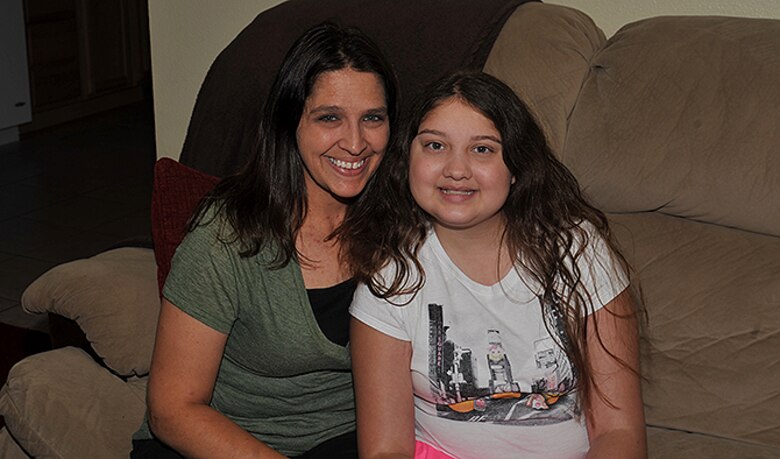 Caitlin and Renee Butcher pose for a picture Aug. 18, 2016, at their home. Caitlin was accepted into the Make A Wish Foundation back in April. Caitlin has an autoimmune processing disorder doctors have yet to diagnose. (U.S. Air Force photo/Staff Sgt. Samantha Krolikowski)