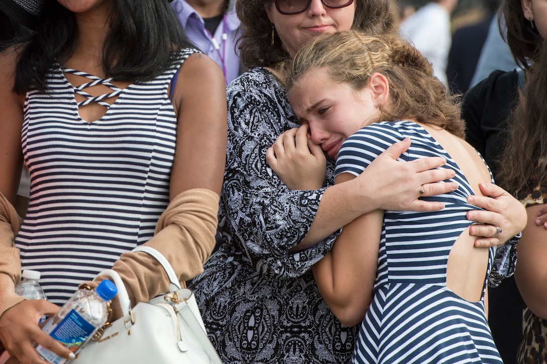 Rachael Fisher, 12, reacts during a ceremony at the National 9/11 Pentagon Memorial marking the 15th anniversary of the 9/11 attacks, Sept. 11, 2016. Her grandfather, Gerald Fisher, died in the attack on the Pentagon. DoD photo by Air Force Tech. Sgt. Brigitte N. Brantley