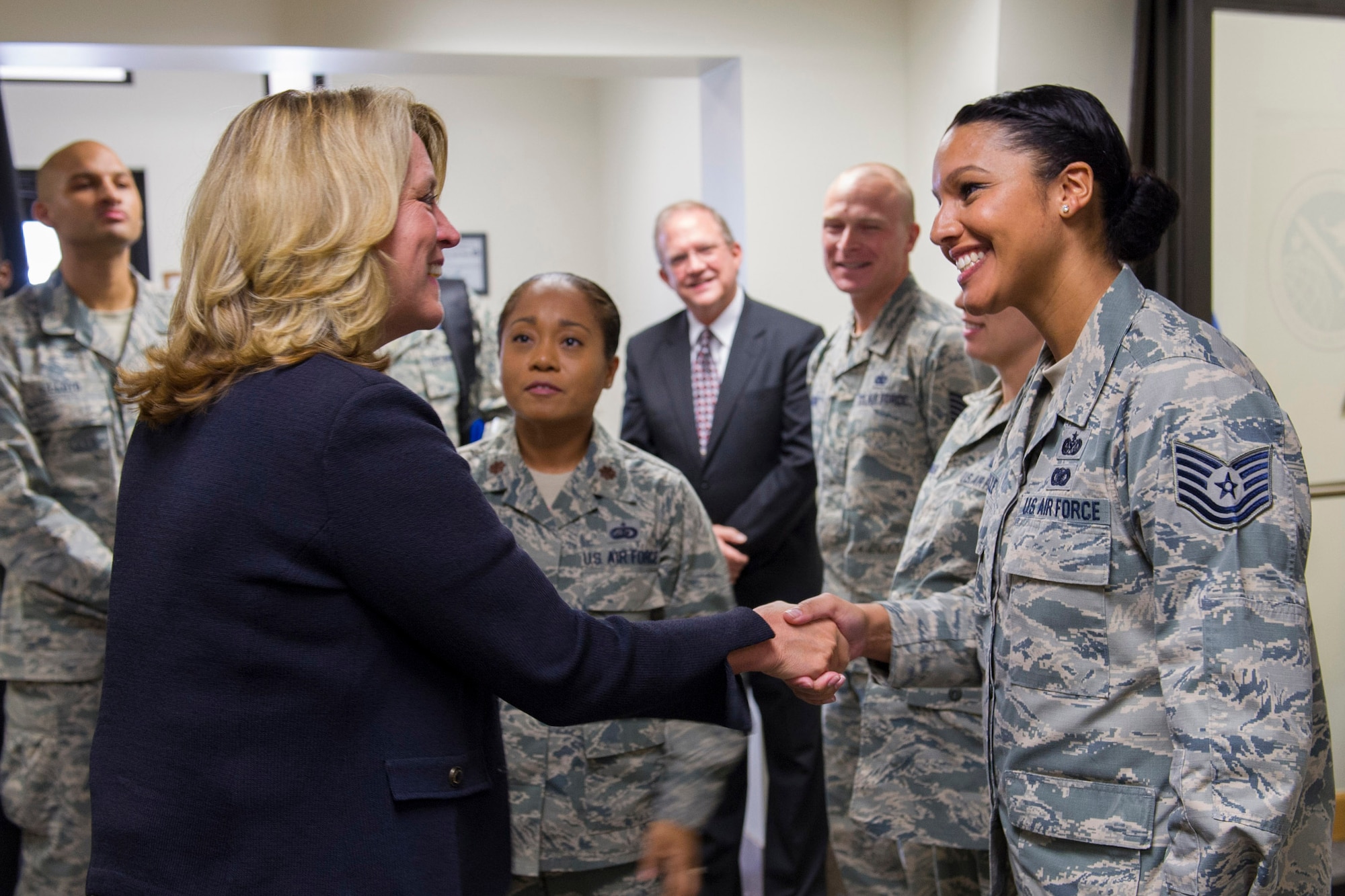The Secretary of the Air Force Deborah Lee James shakes hands with Tech. Sgt. Tamara Acfalle, 45th Force Support Squadron Airman Leadership School instructor Sept. 9, 2016, at Patrick Air Force Base Fla. The meeting was a chance for Airmen to speak directly with the secretary about Air Force topics and their role in space operations. (U.S. Air Force photo/Matthew Jurgens)