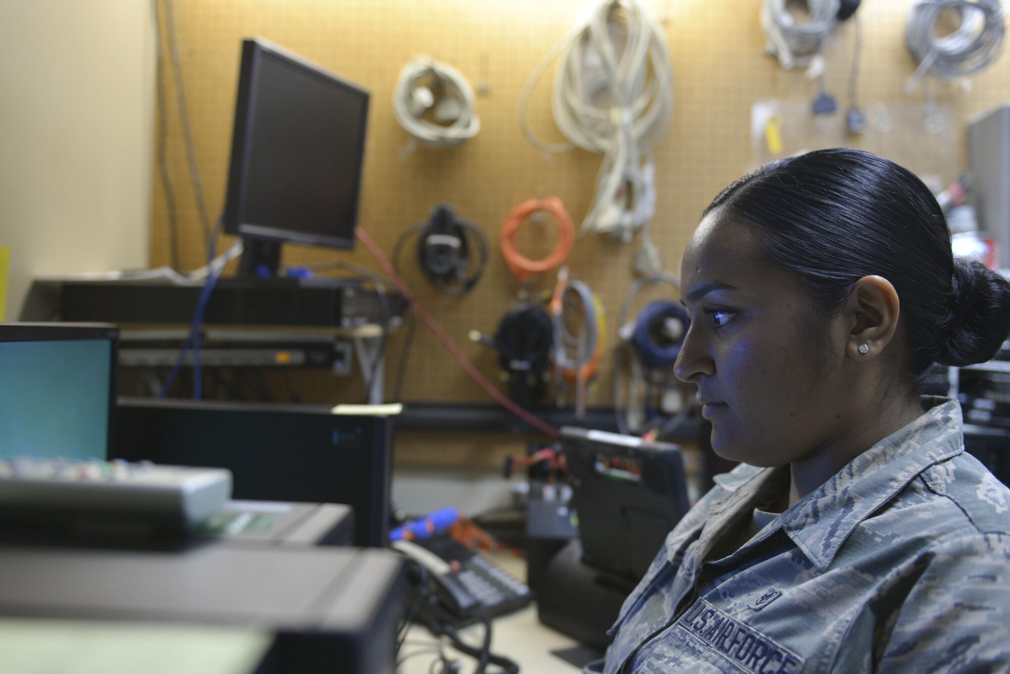 U.S. Air Force Airman 1st Class Taylor Boodooram, a 354th Medical Support Squadron medical information systems technician, works on a computer Sept. 7, 2016, at Eielson Air Force Base, Alaska. Boodooram is allowed to work with computers because she has a background in information technology. (U.S. Air Force photo by Airman Isaac Johnson)