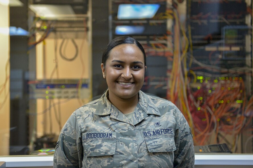 U.S. Air Force Airman 1st Class Taylor Boodooram, a 354th Medical Support Squadron medical information systems technician, takes a brief break Sept. 7, 2016, at Eielson Air Force Base, Alaska. Boodooram said her favorite part of her job is being able to support and assist those around her both on- and off-duty. (U.S. Air Force photo by Airman Isaac Johnson)