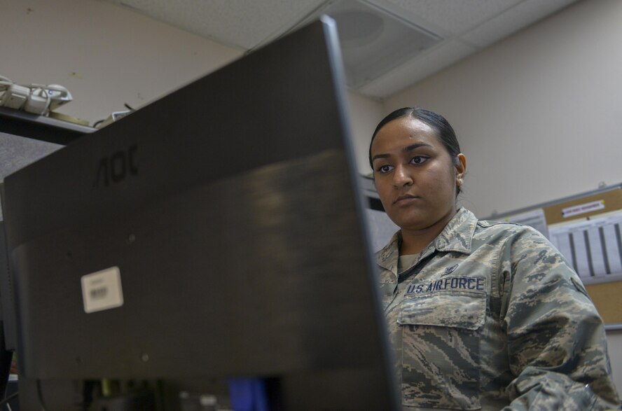U.S. Air Force Airman 1st Class Taylor Boodooram, a 354th Medical Support Squadron medical information systems technician, creates a document on a computer Sept. 7, 2016, at Eielson Air Force Base, Alaska. The document Boodooram is creating will help people fix computer problems. (U.S. Air Force photo by Airman Isaac Johnson)