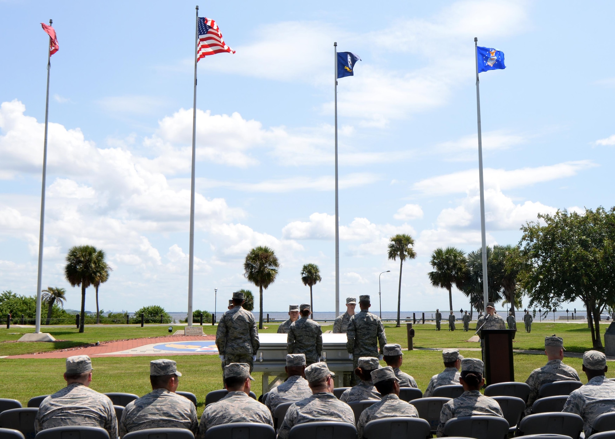 The MacDill Base Honor Guard practices a full-honors funeral during an honor guard graduation ceremony at MacDill Air Force Base, Fla., Sept. 6, 2016. The U.S. Air Force Honor Guard Mobile Training Team hosted the mock ceremony in order to showcase the proficiency the base honor guard gained during a seven-day training course. (U.S. Air Force photo by Tech. Sgt. Krystie Martinez)