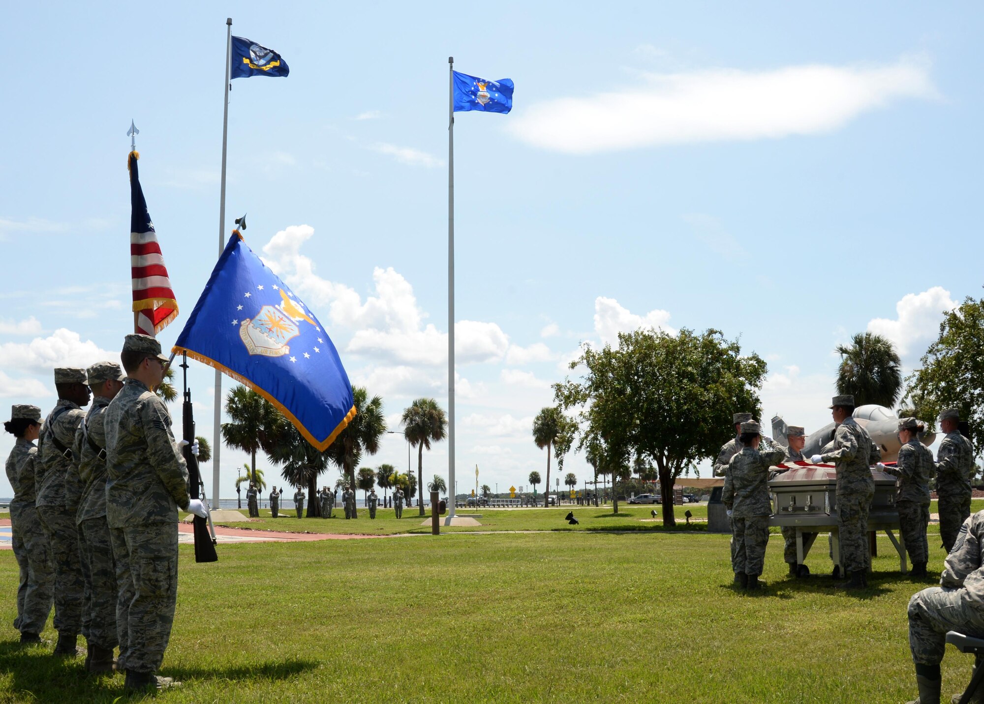 The MacDill Base Honor Guard practices a full-honors funeral during an honor guard graduation ceremony at MacDill Air Force Base, Fla., Sept. 6, 2016. The U.S. Air Force Honor Guard Mobile Training Team hosted the mock ceremony in order to showcase the proficiency the base honor guard gained during a seven-day training course. (U.S. Air Force photo by Tech. Sgt. Krystie Martinez)