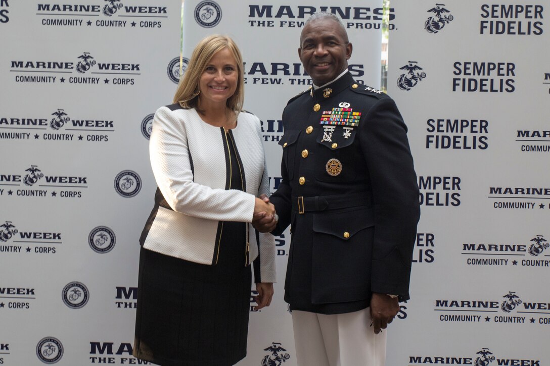 Megan C. Barry and Lt. Gen. Ronald L. Bailey pose during the Community Leaders Reception at the Country Music Hall of Fame and Museum in Nashville, Tenn., Sept. 6, 2016. The reception is held to increase access to diverse community leaders, support Recruiting Station Nashville's recruiting mission and generate excitement for Marine Week, preceding the start of the event Sept. 7, 2016. Marine Week, an annual event held in a different city each year, is a celebration of Community, Country and Corps that allows the public to learn about the Corps through hands-on static displays, live demonstrations, time-honored Marine Corps traditions, musical performances and more. Barry is the 7th mayor of the Metropolitan Government of Nashville and Davidson County. Bailey is the Deputy Commandant for Plans, Policies and Operations.