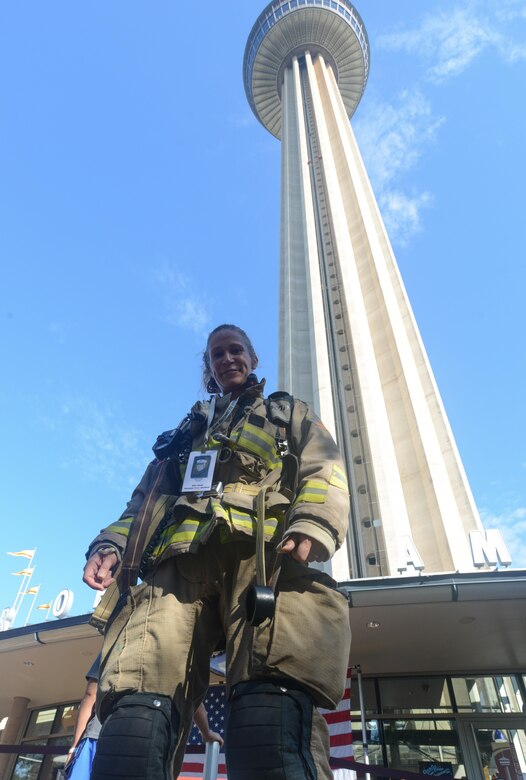 SAN ANTONIO – Dawn Solinski, San Antonio 110 event coordinator, poses for a photo in front of the Tower of the Americas after finishing the memorial climb. The San Antonio 110 committee was founded in 2013 by a group of firefighters. The memorial climb, held at the in the city’s downtown, is to pay tribute to the 343 firefighters who lost their lives on September 11, 2001. (Photo by Army Reserve Staff Sgt. Nina J. Ramon, 205 Press Camp Headquarters)