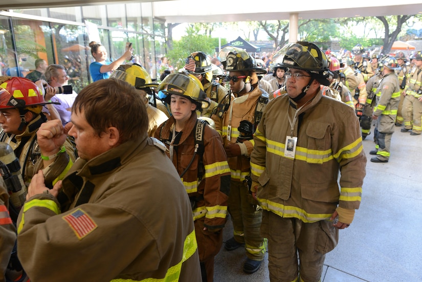 SAN ANTONIO – As the memorial climb begins Joe Ocha (right), a U.S. Army Reserve veteran, joins his fellow firefighters as they begin the ascend up the Tower of the Americas stairs Sept 11, 2016. Ocha is a member of the St. Hedwig Fire Department, located near San Antonio. The memorial climb is hosted by the San Antonio 110 committee in honor of the to the 343 firefighters who lost their lives on September 11, 2001. (Photo by Army Reserve Staff Sgt. Nina J. Ramon, 205 Press Camp Headquarters)