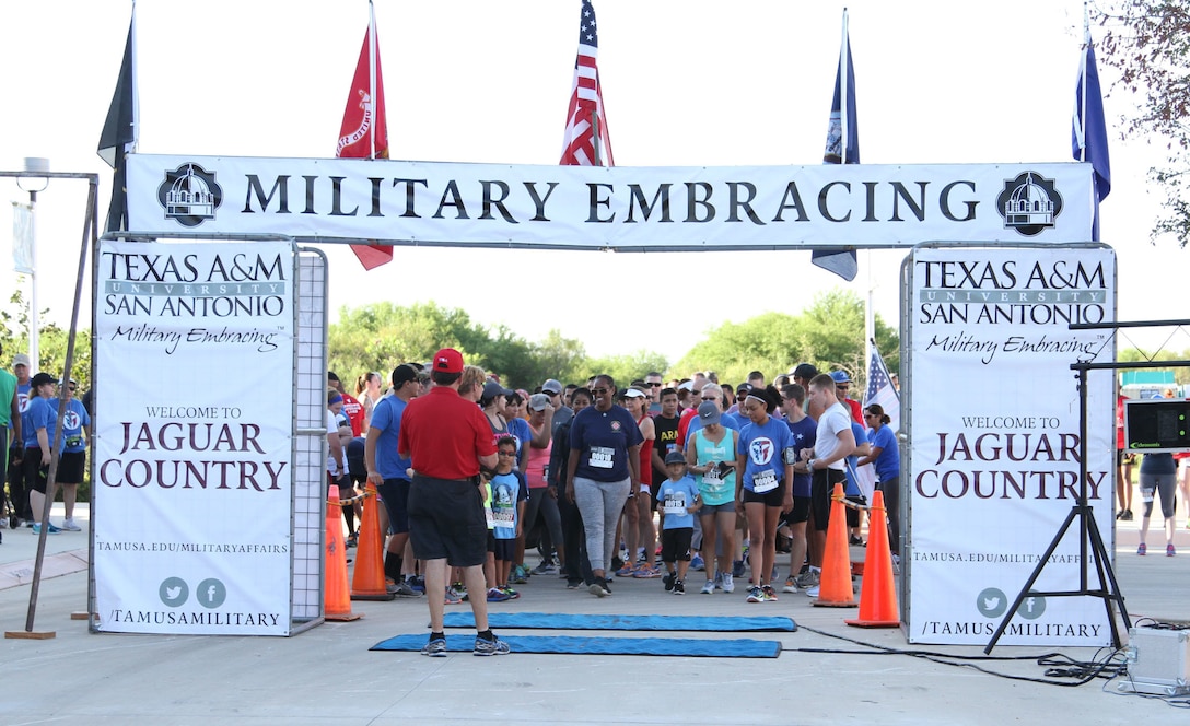 Racers lined up to ruthe 9/11 Heroes Run in honor of the September 11, 2001 terrorist attacks, Sept. 11, 2016, at Texas A&M University-San Antonio, Texas. Texas A&M University-San Antonio was nominated to receive a sapling from the 9/11 Survivor Tree, which was the sole surviving tree that remained after the destruction of the World Trade Center buildings. (U.S. Army Reserve photo by SPC. Vincent Gonzalez 345th Public Affairs Detachment/Released)