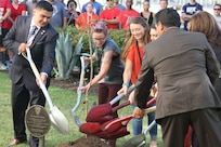 Family members of victims of the September 11, 2001 terrorist attacks on the World Trade Center buildings and members of the Texas A&M San Antonio faculty plant a sapling on their campus, Sept. 11, 2016, San Antonio. Texas A&M University-San Antonio was nominated to receive a sapling from the 9/11 Survivor Tree, which was the sole surviving tree that remained after the destruction of the World Trade Center buildings. (U.S. Army Reserve photo by SPC. Vincent Gonzalez 345th Public Affairs Detachment/Released)