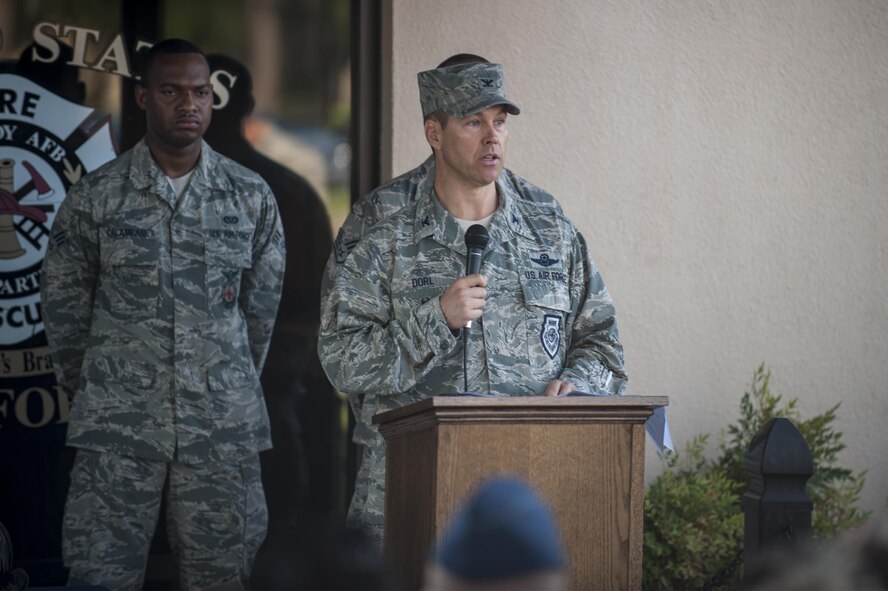 U.S. Air Force Col. Thomas Dorl, 23d Wing acting vice commander, speaks during a 9/11 memorial ceremony, Sept. 11, 2016, at Moody Air Force Base, Ga. On Sept. 11, 2001, New York City fire and police departments were flooded with outside agencies offering any assistance, leading thousands of firefighters, police officers and paramedics to travel to New York City. (U.S. Air Force photo by Airman 1st Class Daniel Snider)