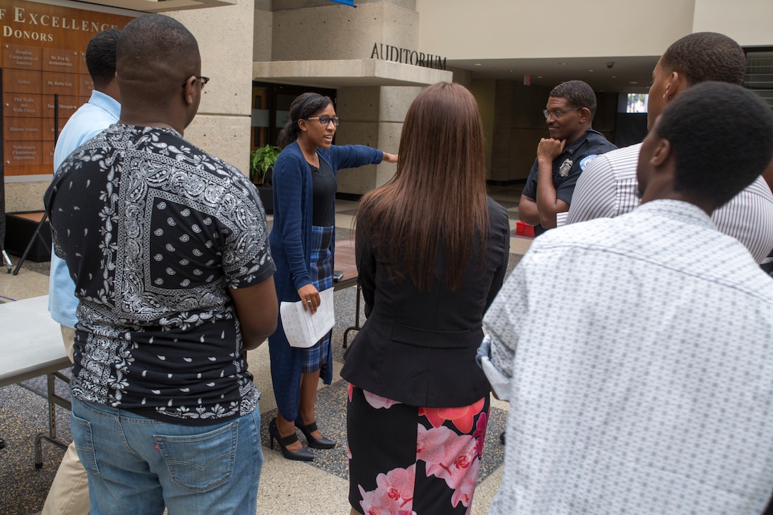 Tiara Hudson briefs her squad during the practical application portion of the Marine Corps Leadership Seminar at Tennessee State University as part of Marine Week Nashville, Sept. 7, 2016. The seminar provides the Marine Corps with an opportunity to communicate a message of leadership and integrity and the opportunities the Marine Corps provides to a diverse population of students. Marine Week provides the opportunity for Marines to commemorate the unwavering support of the American people, and share their story of the Marines to a city that doesn't have opportunities to interact with Marines on a regular basis. Hudson is a Nashville native and Freshman at TSU.