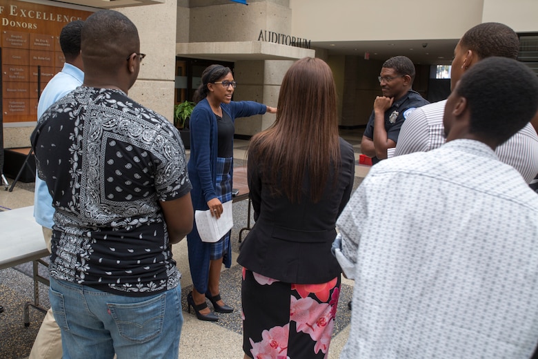 Tiara Hudson briefs her squad during the practical application portion of the Marine Corps Leadership Seminar at Tennessee State University as part of Marine Week Nashville, Sept. 7, 2016. The seminar provides the Marine Corps with an opportunity to communicate a message of leadership and integrity and the opportunities the Marine Corps provides to a diverse population of students. Marine Week provides the opportunity for Marines to commemorate the unwavering support of the American people, and share their story of the Marines to a city that doesn't have opportunities to interact with Marines on a regular basis. Hudson is a Nashville native and Freshman at TSU.
