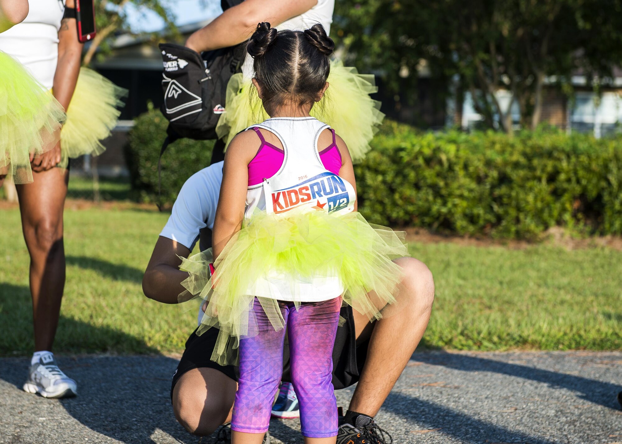 A participant gets ready before the start of a Kid’s Color Run, Sept. 10, 2016, at Moody Air Force Base, Ga. Moody hosted the run as part of the Armed Forces Kids Run initiative, which aims to inspire dependents around the world to stay active. (U.S. Air Force photo by Airman 1st Class Janiqua P. Robinson)