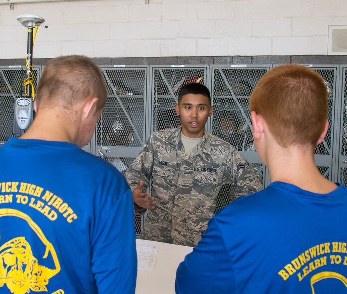 U.S. Air Force Airman 1st Class Fyronne Fabay, 23d Civil Engineer Squadron engineer assistant, talks to Brunswick High School students during the Diversity Day Outreach Fair, Sept. 9, 2016, at Moody Air Force Base, Ga. Fabay spoke about the advantages the visiting students had because they visited a military installation and spoke with Airmen from their potential career fields, giving them a real-world perspective of certain jobs. (U.S. Air Force photo by Airman 1st Class Greg Nash)