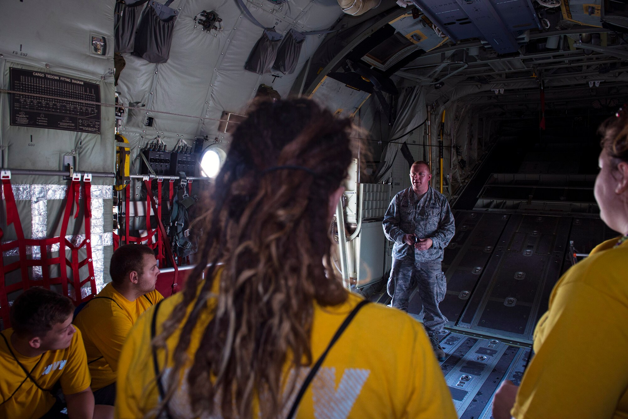 U.S. Air Force Senior Airman Cameron Miller, 71st Aircraft Maintenance Unit HC-130J Combat King II crew chief, talks to students about the HC-130’s capabilities during the Diversity Day Outreach Fair, Sept. 9, 2016, at Moody Air Force Base, Ga. The 336th Recruiting Squadron is the first and only recruiting squadron in their command to host this kind of event. (U.S. Air Force photo by Airman 1st Class Greg Nash)