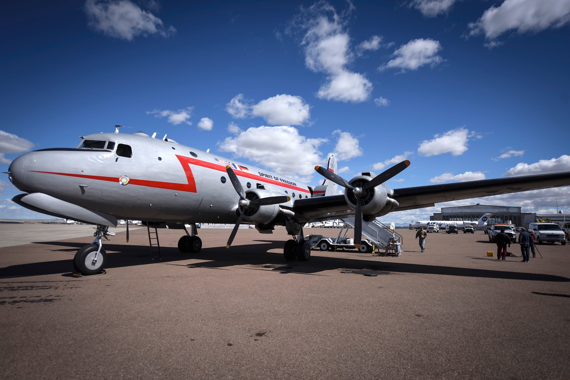 A C-54E Skymaster named “Spirit of Freedom” sits on the tarmac at the Great Falls International Airport, Sept. 9, 2016. The Spirit of Freedom is a flying museum being flown all over the country by members of the Berlin Airlift Historical Foundation to help raise awareness of the Berlin Airlift. The airlift was a mission that saved nearly 2.4 million Germans from the Soviet-controlled East Berlin in the late 1940s and this is one of the only flight-worthy C-54s remaining in the world. (U.S. Air Force photo/Tech. Sgt. Chad Thompson)