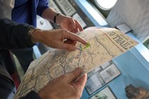 Jim Meinert, executive director of The History Museum in Great Falls, shows the historic route a C-54E Skymaster named “Spirit of Freedom” will fly over Great Falls, Mont., Sept. 9, 2016. The Spirit of Freedom flew a historic route that C-54 pilots and crews used for training in preparation for the Berlin Airlift. (U.S. Air Force photo/Tech. Sgt. Chad Thompson)