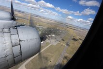 A C-54E Skymaster named “Spirit of Freedom” flies over Malmstrom Air Force Base, Mont., Sept. 9, 2016. The Spirit of Freedom flew a historic route that C-54 pilots and crews used for training in preparation for the Berlin Airlift. (U.S. Air Force photo/Tech. Sgt. Chad Thompson)