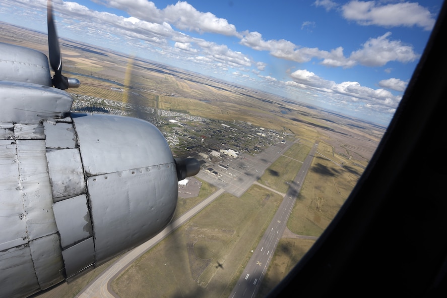 A C-54E Skymaster named “Spirit of Freedom” flies over Malmstrom Air Force Base, Mont., Sept. 9, 2016. The Spirit of Freedom flew a historic route that C-54 pilots and crews used for training in preparation for the Berlin Airlift. (U.S. Air Force photo/Tech. Sgt. Chad Thompson)