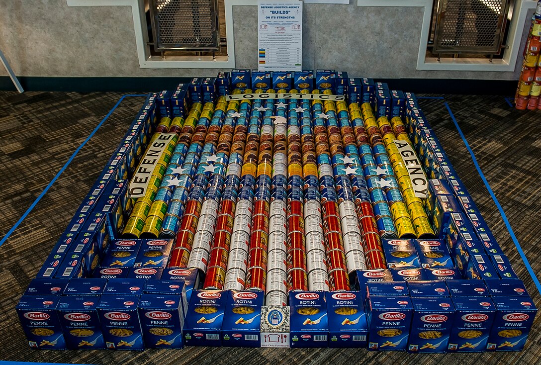 Associates at Defense Logistics Agency Land and Maritime and Defense Finance and Accounting Service in Columbus, Ohio built structures using canned and boxed food items as part of The Build competition. The contest was the culminating event of the annual Feds Feed Families campaign.