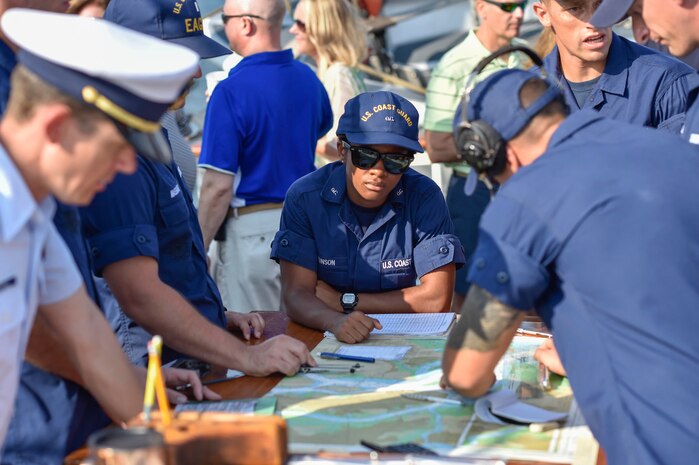 Coast Guard officer candidates with the tall ship, USCGC Eagle, chart their course down the Cooper River in Charleston, South Carolina, Sept. 9, 2016. The Eagle offers future Coast Guard officers the opportunity to practice navigation, engineering and leadership duties performed by junior officers. A permanent crew of eight officers and 50 enlisted personnel maintain the ship throughout the year. (U.S. Air Force Photo/Airman Megan Munoz)