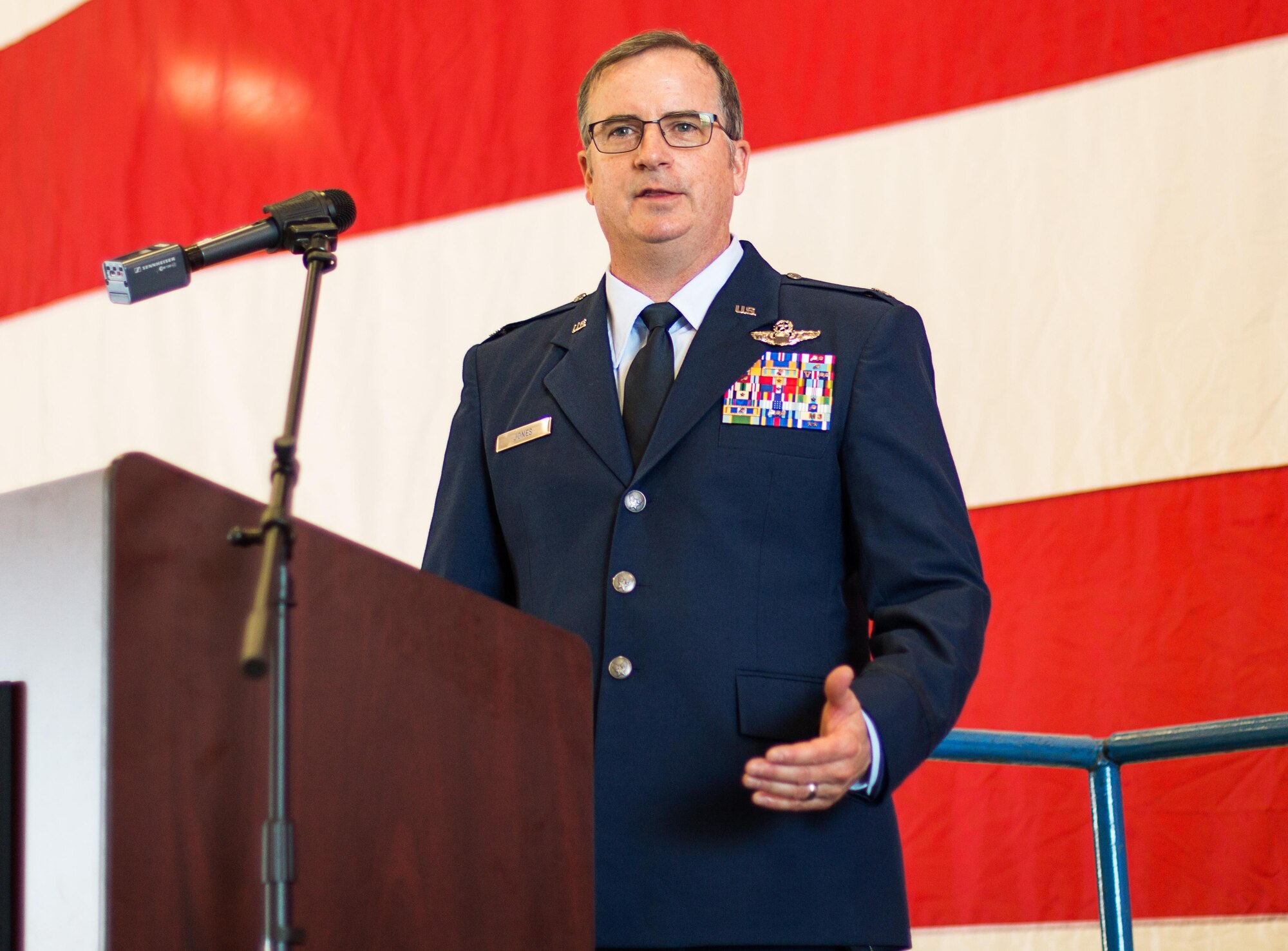 Col. Gregory C. Jones addresses the 301st Fighter Wing as the new commander during a change of command ceremony at the hangar Sept. 11 at Naval Air Station Fort Worth Joint Reserve Base, Texas. Maj. Gen. Richard W. Scobee, 10th Air Force commander, presided over the ceremony. Jones joins the wing from 10th Air Force where he was the director of operations and plans. He is a command pilot with more than 4,400 flying hours in various aircraft. (U.S. Air Force photo by Master Sgt. Josh Woods)