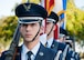 Senior Airman Benjamin Shelton, 33rd Fighter Wing Maintenance Squadron, prepares to present the colors during the 9/11 Memorial Run Sept. 9 at the All Wars Memorial at Eglin Air Force Base, Fla. Approximately 250 runners and walkers participated in the run to honor and remember the fallen of the 9/11 terror attacks committed 15 years ago. (U.S. Air Force photo/Ilka Cole)