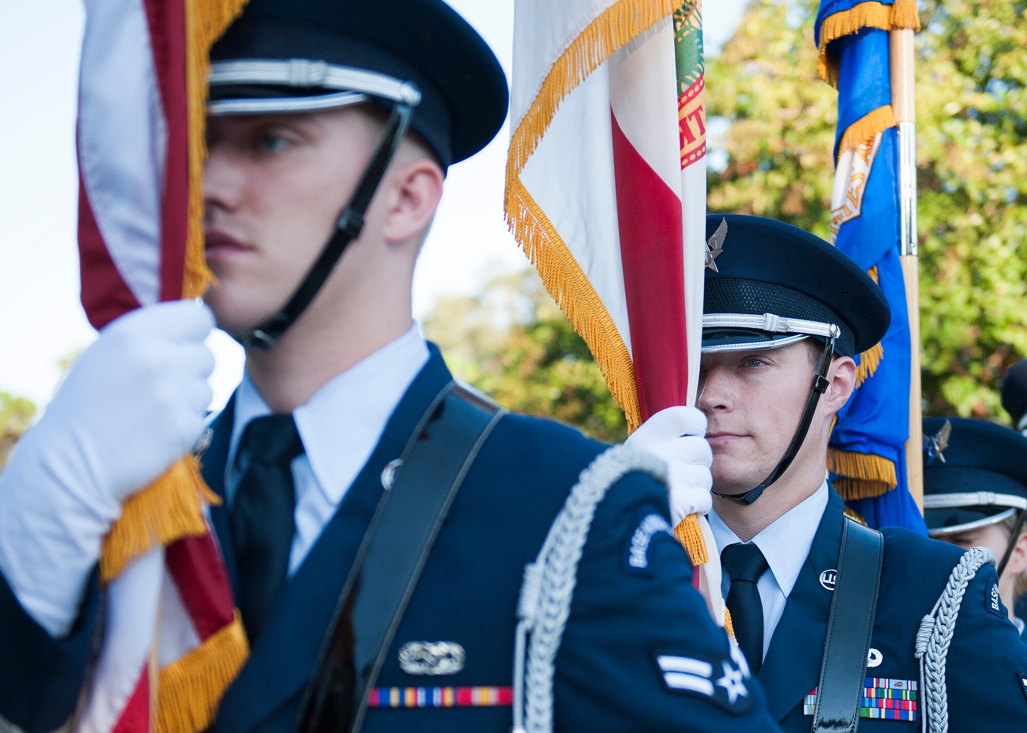 Staff Sgt. David Bell, 96th Maintenance Squadron, prepares to present the colors during the 9/11 Memorial Run Sept. 9 at the All Wars Memorial at Eglin Air Force Base, Fla. Approximately 250 runners and walkers participated in the run to honor and remember the fallen of the 9/11 terror attacks committed 15 years ago. (U.S. Air Force photo/Ilka Cole)