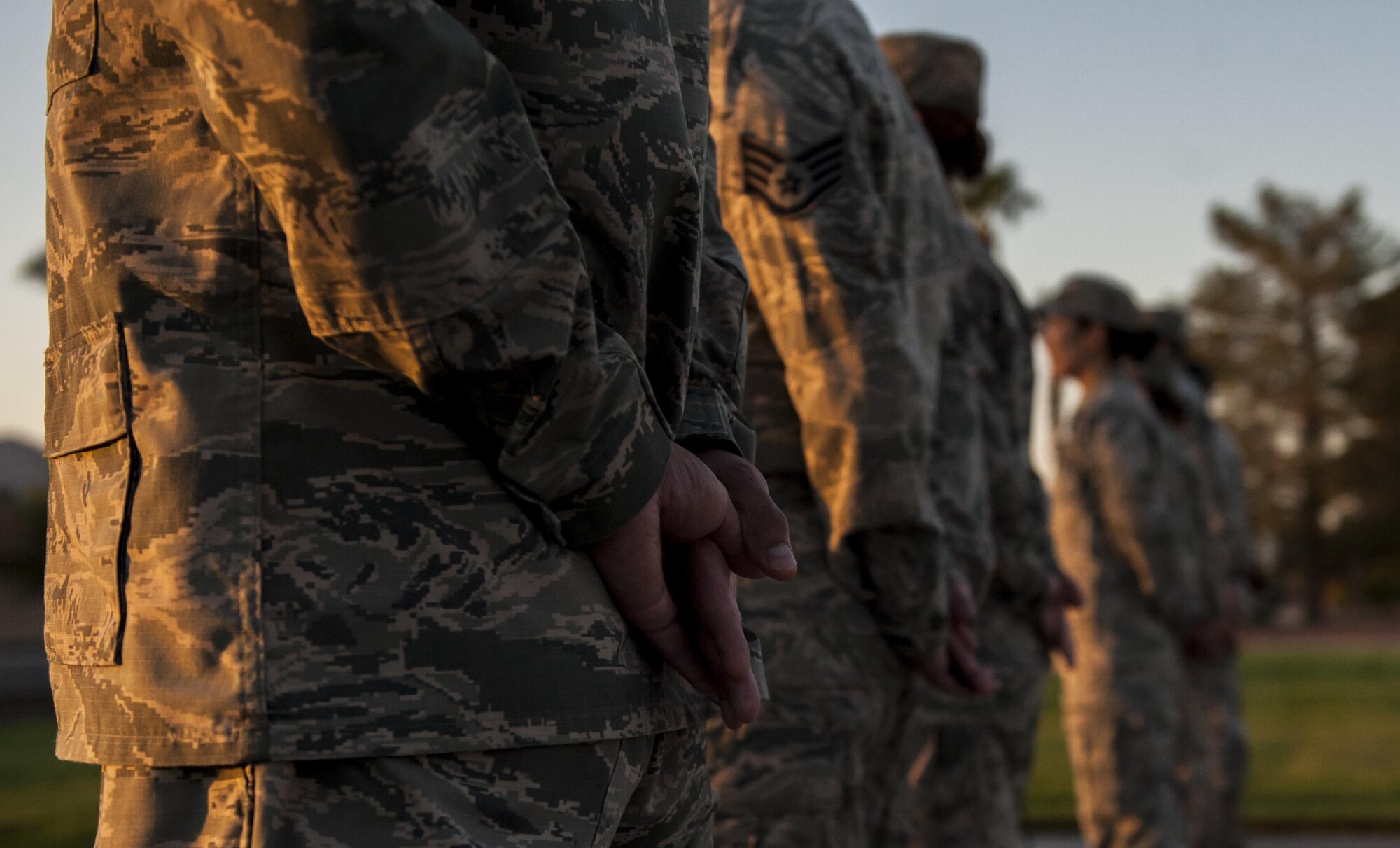 Airmen from Nellis Air Force Base stand at post to honor the lives lost on Sept. 11 in front of the United States Air Force Warfare Center, Sept. 9, 2016. Sept. 11th was a defining moment in American History, and part of honoring those that were lost is remembering just how the event affected this country and its people. (U.S. Air Force photo by Airman 1st Class Kevin Tanenbaum/Released)