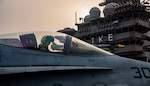 A Navy pilot assigned to Strike Fighter Squadron 131 taxies an F/A-18C Hornet on the flight deck of the aircraft carrier USS Dwight D. Eisenhower in the Persian Gulf, Sept. 9, 2016. The Eisenhower and its carrier strike group are deployed in support of Operation Inherent Resolve, maritime security operations and theater security cooperation efforts in the U.S. 5th Fleet area of operations. Navy photo by Petty Officer 3rd Class Nathan T. Beard