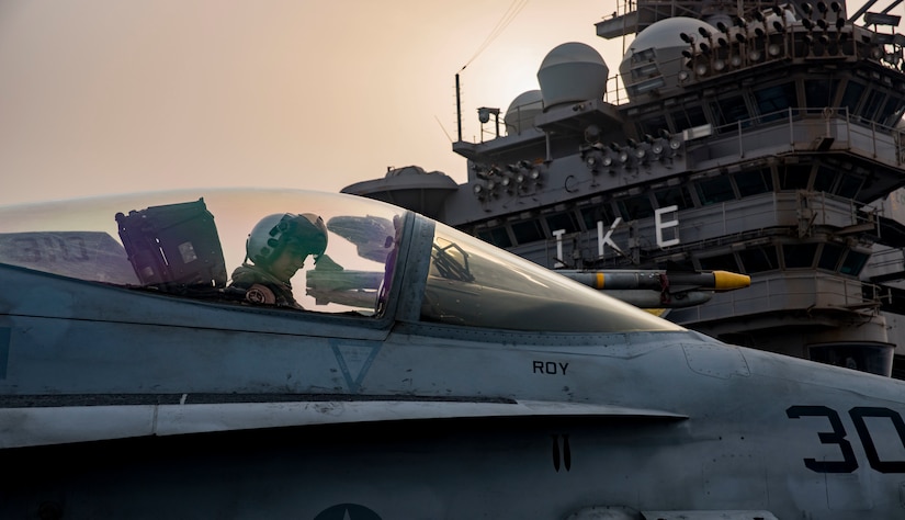 A Navy pilot assigned to Strike Fighter Squadron 131 taxies an F/A-18C Hornet on the flight deck of the aircraft carrier USS Dwight D. Eisenhower in the Persian Gulf, Sept. 9, 2016. The Eisenhower and its carrier strike group are deployed in support of Operation Inherent Resolve, maritime security operations and theater security cooperation efforts in the U.S. 5th Fleet area of operations. Navy photo by Petty Officer 3rd Class Nathan T. Beard