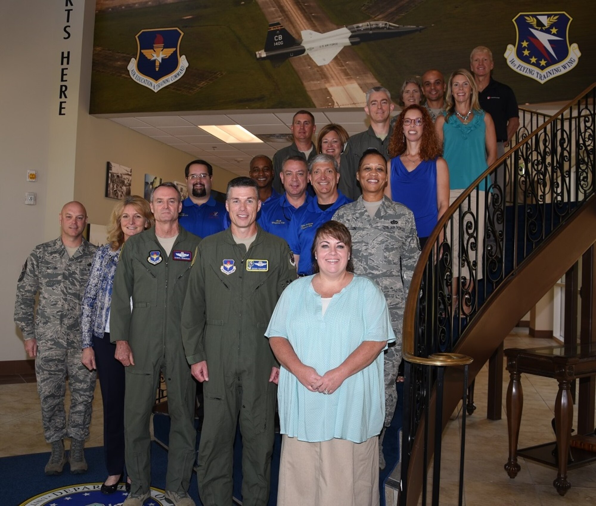 Lt. Gen. Darryl Roberson, commander of Air Education and Training Command, and Mrs. Roberson pause for a photo with Col. Douglas Gosney, 14th Flying Training Wing Commander, Mrs. Gosney, Columbus Air Force Base leaders and Columbus community members Sept. 12, 2016. During his visit, Roberson toured base facilities, met with Airmen, and held an all-call to discuss AETC hot topics. (U.S. Air Force photo/Elizabeth Owens)